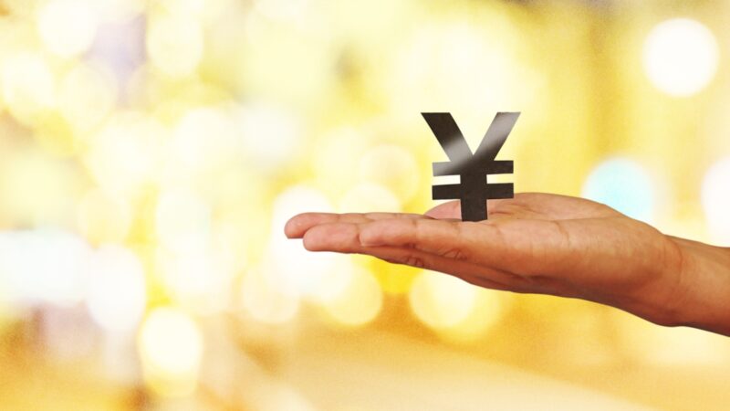 円マークを乗せる手